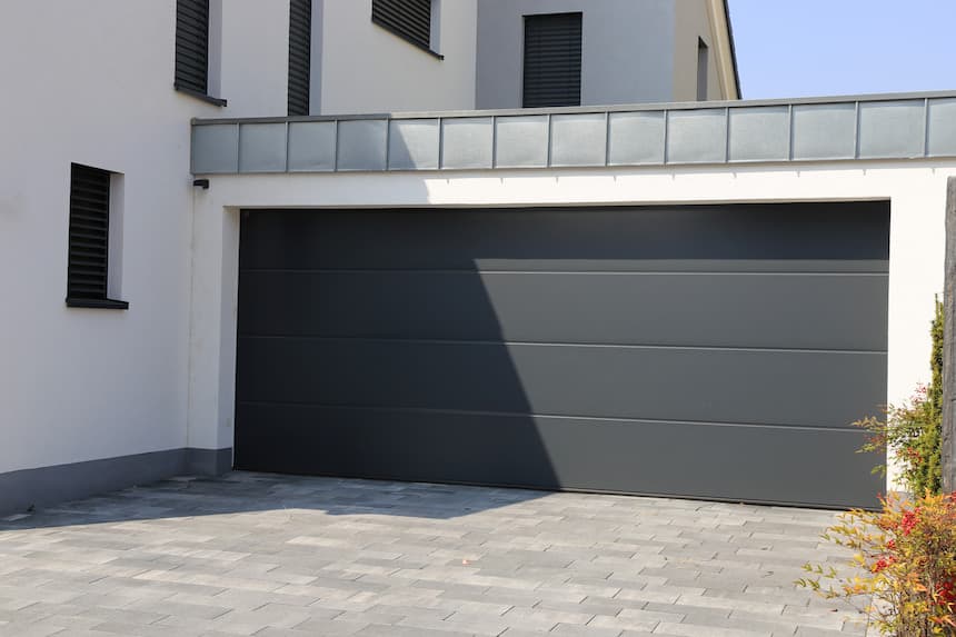 Installation porte garage sectionnelle